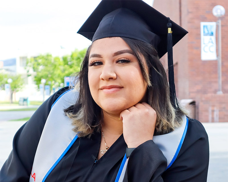 Female college student in graduation outfit